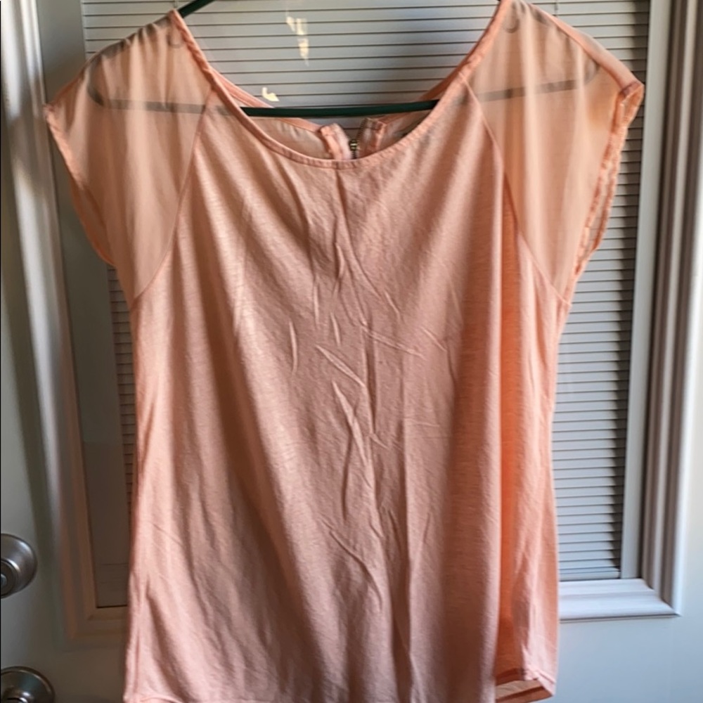 Peach blouse with silk-like arms